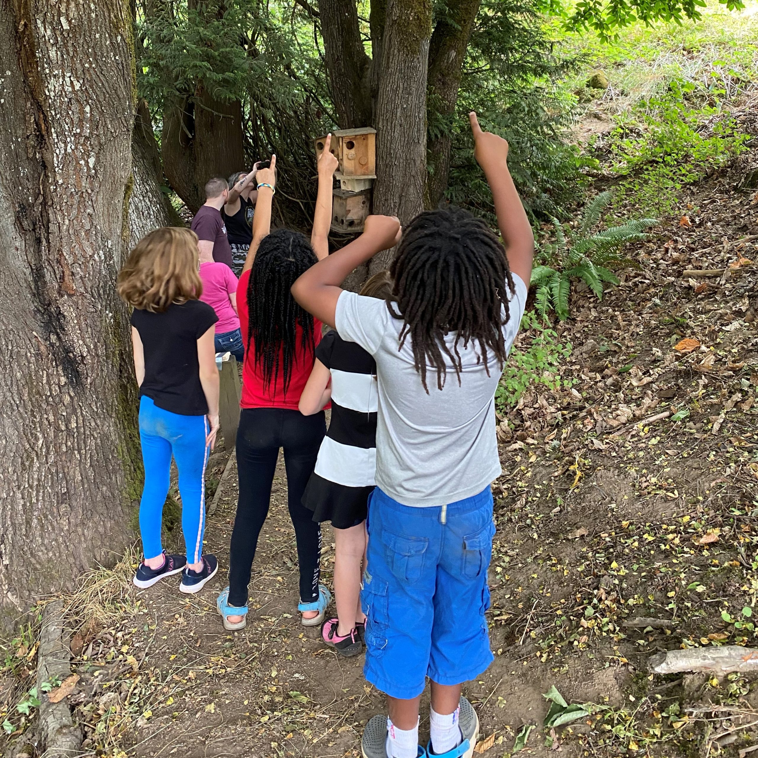 Students at Columbia Springs summer camp with educator Shelly