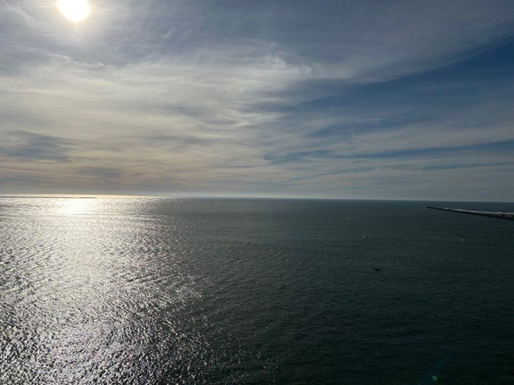 View looking out from Cape Disappointment light house toward the mouth of Columbia. You can see the North and South Jetties.