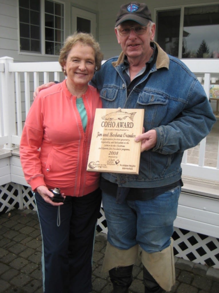 Barb and Jim Orander with the “Coho Award” after their first 10 years raising salmon